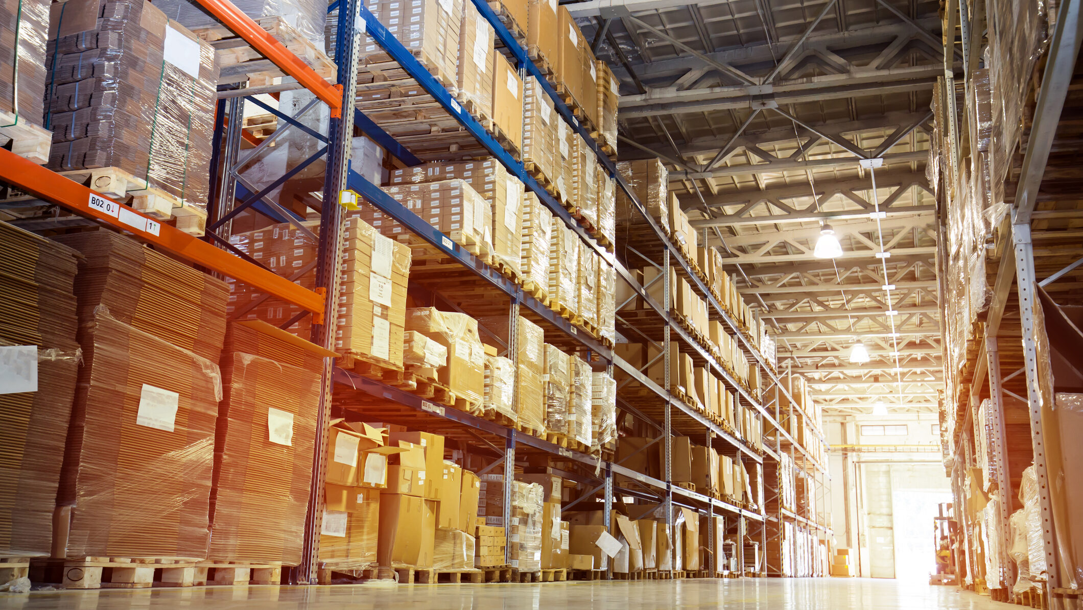 stacked boxes on warehouse shelves